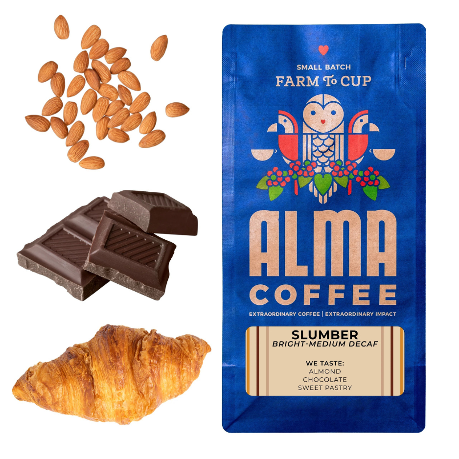 Alma Coffee package with almonds, chocolate, and a croissant on a white background